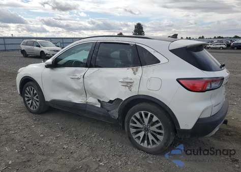 2020 Ford Escape Titanium z USA, uszkodzony, nr VIN 1FMCU9J95LUC33237